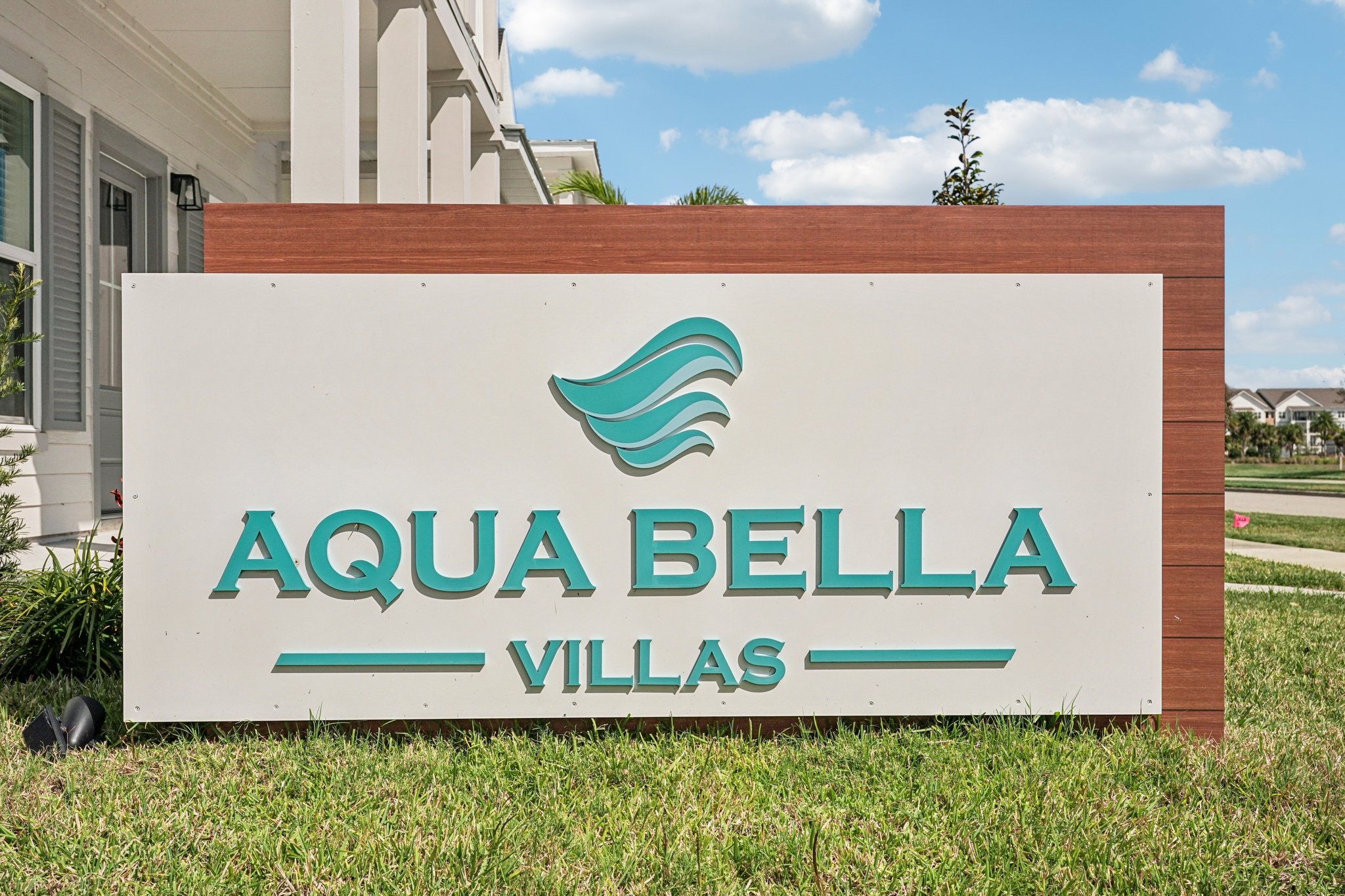 Aqua Bella Villas community sign